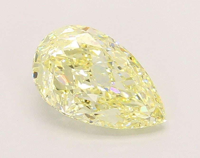 Loose Diamond - PEAR 2.07ct Fancy Yellow VVS2: Loose Diamond - PEAR 2.07ct Fancy Yellow VVS2 Source: This is a real non-mined Diamond that has been grown in a lab Shape: PEAR Carats: 2.07 Color: Fancy Yellow Certification: IGI Video: Video Link