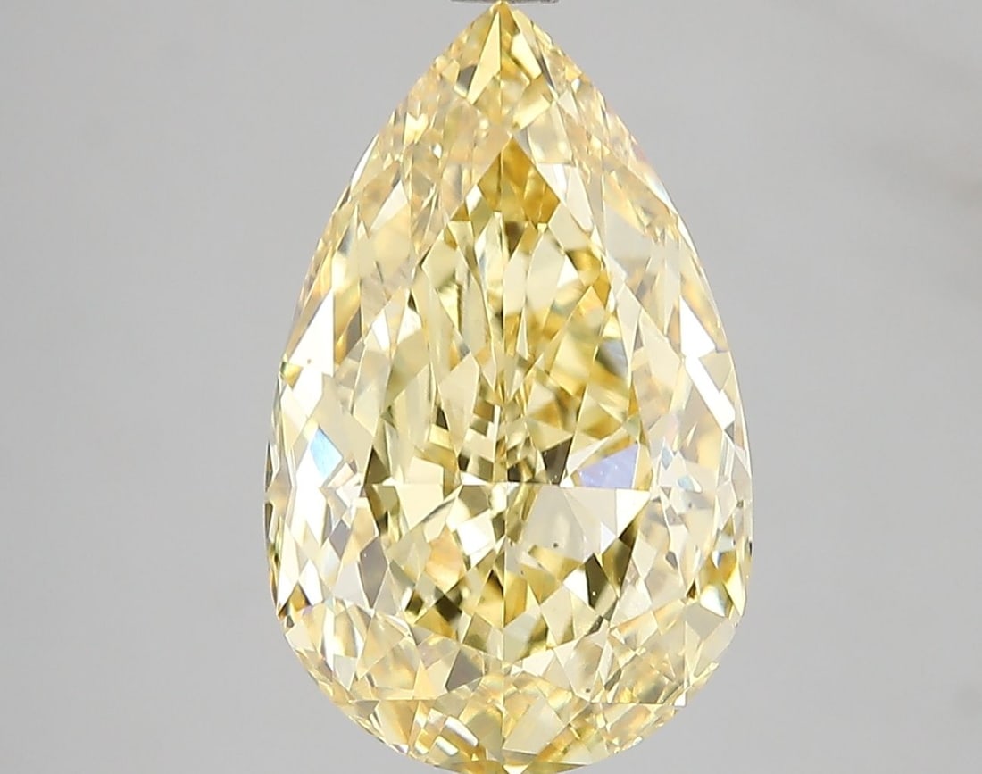 Loose Diamond - PEAR 5.05ct Fancy Vivid Yellow VVS2: Loose Diamond - PEAR 5.05ct Fancy Vivid Yellow VVS2 Source: This is a real non-mined Diamond that has been grown in a lab Shape: PEAR Carats: 5.05 Color: Fancy Vivid Yellow Certification: IGI Video: