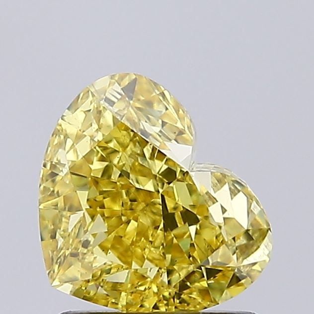 Loose Diamond - HEART 1.53ct Fancy Intense Yellow SI1: Loose Diamond - HEART 1.53ct Fancy Intense Yellow SI1 Source: This is a real non-mined Diamond that has been grown in a lab Shape: HEART Carats: 1.53 Color: Fancy Intense Yellow Certification: IGI Vid