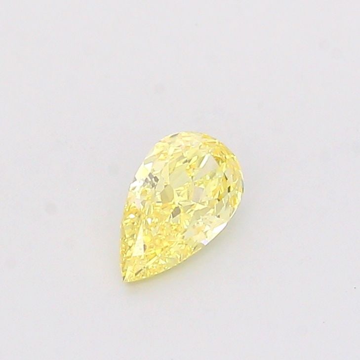 Loose Diamond - PEAR 1.09ct Fancy Vivid Yellow VS1: Loose Diamond - PEAR 1.09ct Fancy Vivid Yellow VS1 Source: This is a real non-mined Diamond that has been grown in a lab Shape: PEAR Carats: 1.09 Color: Fancy Vivid Yellow Certification: IGI Video: