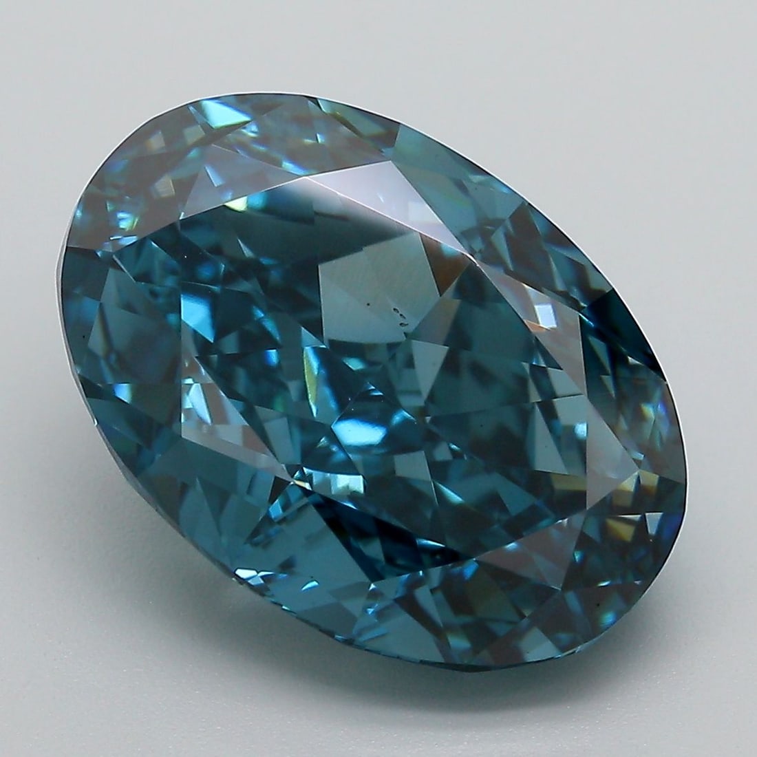 Loose Diamond - OVAL 9.59ct Fancy Vivid Blue VS1: Loose Diamond - OVAL 9.59ct Fancy Vivid Blue VS1 Source: This is a real non-mined Diamond that has been grown in a lab Shape: OVAL Carats: 9.59 Color: Fancy Vivid Blue Certification: IGI Video: