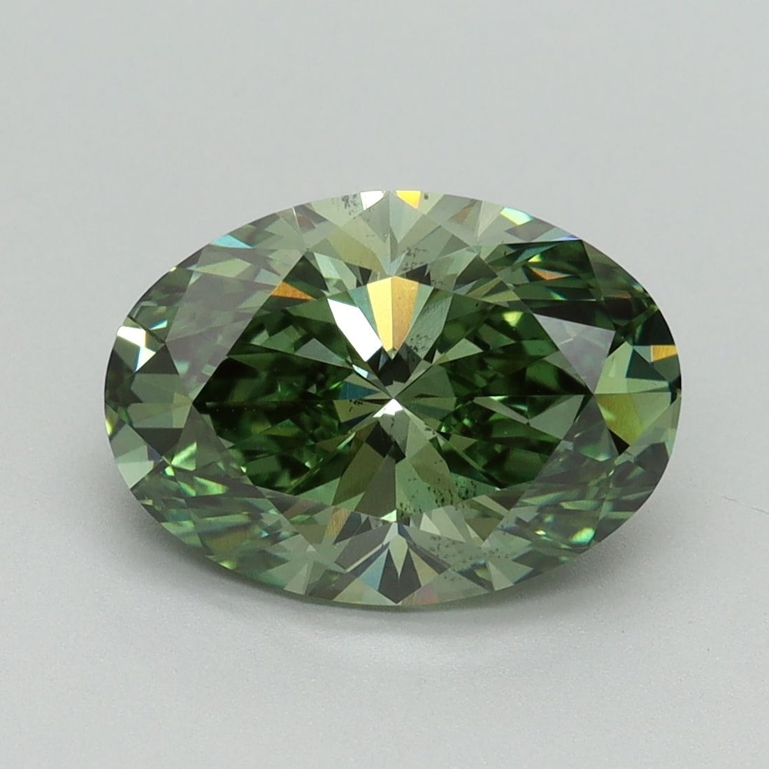 Loose Diamond - OVAL 3.04ct Fancy Vivid Green SI1: Loose Diamond - OVAL 3.04ct Fancy Vivid Green SI1 Source: This is a real non-mined Diamond that has been grown in a lab Shape: OVAL Carats: 3.04 Color: Fancy Vivid Green Certification: IGI Video: