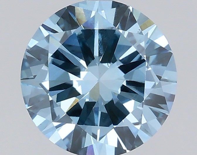 Loose Diamond - ROUND 0.9ct Fancy Vivid Blue VS1: Loose Diamond - ROUND 0.9ct Fancy Vivid Blue VS1 Source: This is a real non-mined Diamond that has been grown in a lab Shape: ROUND Carats: 0.9 Color: Fancy Vivid Blue Certification: IGI Video: