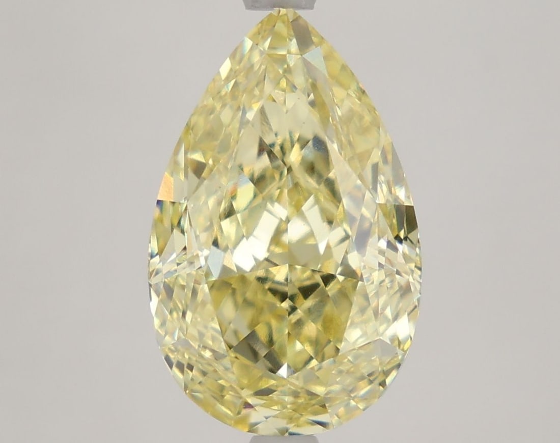 Loose Diamond - PEAR 5.46ct Fancy Intense Yellow VVS2: Loose Diamond - PEAR 5.46ct Fancy Intense Yellow VVS2 Source: This is a real non-mined Diamond that has been grown in a lab Shape: PEAR Carats: 5.46 Color: Fancy Intense Yellow Certification: IGI Vide