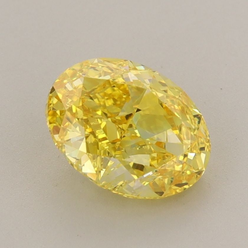 Loose Diamond - OVAL 1.73ct Fancy Vivid Yellow VVS2: Loose Diamond - OVAL 1.73ct Fancy Vivid Yellow VVS2 Source: This is a real non-mined Diamond that has been grown in a lab Shape: OVAL Carats: 1.73 Color: Fancy Vivid Yellow Certification: IGI Video: