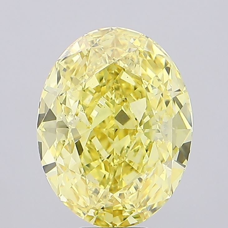 Loose Diamond - OVAL 12.32ct Fancy Vivid Yellow VS1: Loose Diamond - OVAL 12.32ct Fancy Vivid Yellow VS1 Source: This is a real non-mined Diamond that has been grown in a lab Shape: OVAL Carats: 12.32 Color: Fancy Vivid Yellow Certification: IGI Video: