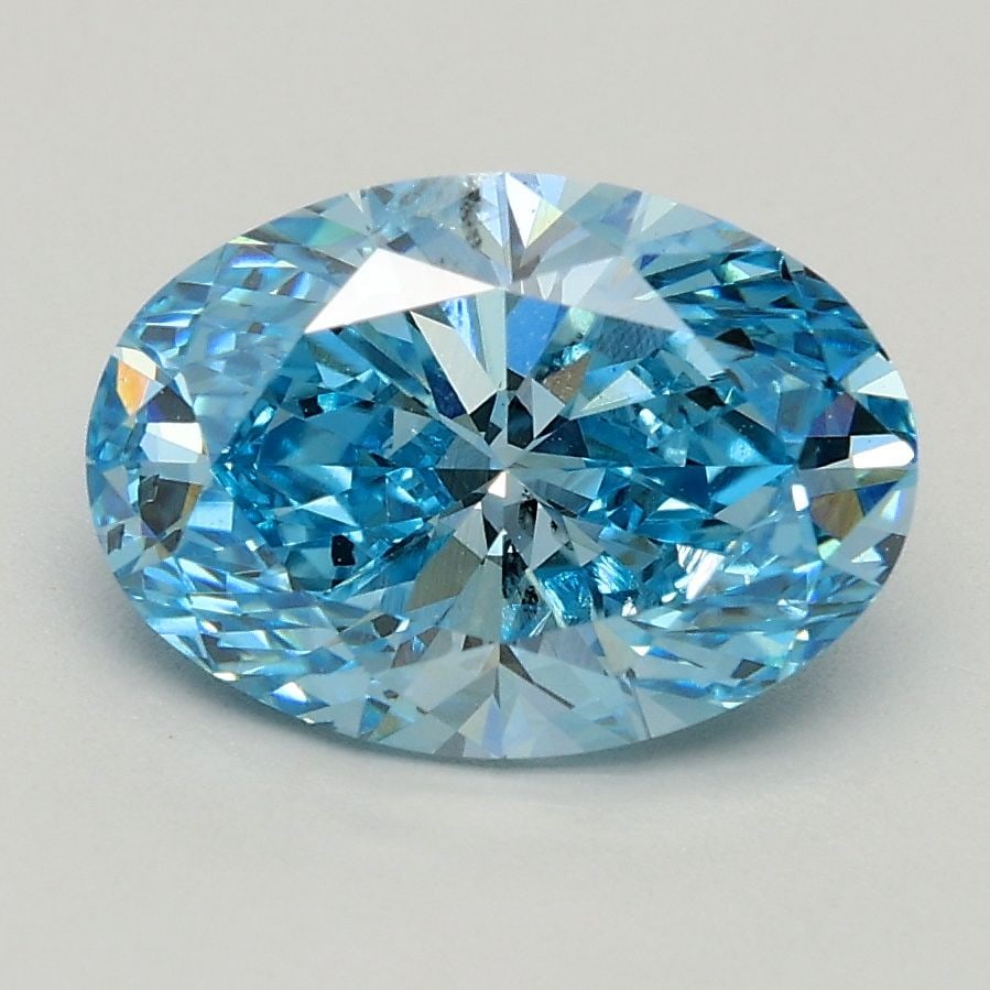Loose Diamond - OVAL 1.59ct Fancy Vivid Blue SI2: Loose Diamond - OVAL 1.59ct Fancy Vivid Blue SI2 Source: This is a real non-mined Diamond that has been grown in a lab Shape: OVAL Carats: 1.59 Color: Fancy Vivid Blue Certification: IGI Video:
