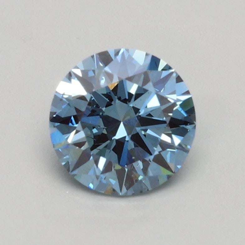 Loose Diamond - ROUND 0.68ct Fancy Intense Blue SI1: Loose Diamond - ROUND 0.68ct Fancy Intense Blue SI1 Source: This is a real non-mined Diamond that has been grown in a lab Shape: ROUND Carats: 0.68 Color: Fancy Intense Blue Certification: IGI Video: