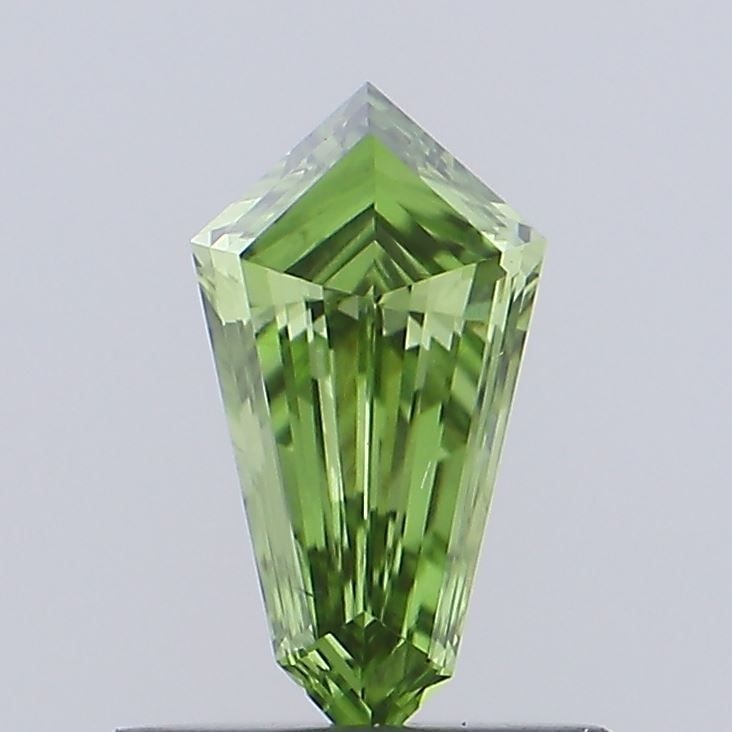 Loose Diamond - SHIELD 0.48ct Fancy Vivid Green VS2: Loose Diamond - SHIELD 0.48ct Fancy Vivid Green VS2 Source: This is a real non-mined Diamond that has been grown in a lab Shape: SHIELD Carats: 0.48 Color: Fancy Vivid Green Certification: IGI Video: