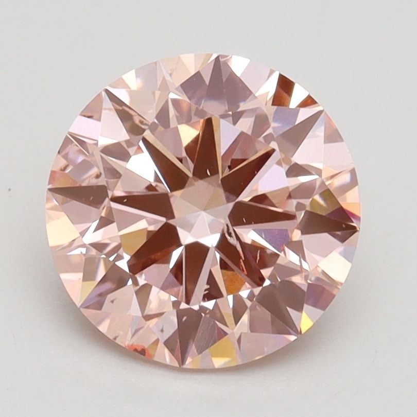Loose Diamond - ROUND 2.01ct Fancy Pink SI2: Loose Diamond - ROUND 2.01ct Fancy Pink SI2 Source: This is a real non-mined Diamond that has been grown in a lab Shape: ROUND Carats: 2.01 Color: Fancy Pink Certification: IGI Video: