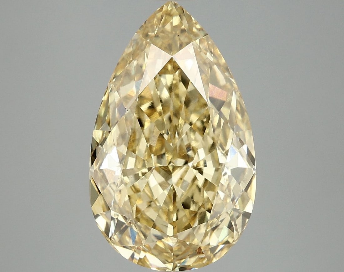 Loose Diamond - PEAR 5.03ct Fancy Vivid Yellow VS2: Loose Diamond - PEAR 5.03ct Fancy Vivid Yellow VS2 Source: This is a real non-mined Diamond that has been grown in a lab Shape: PEAR Carats: 5.03 Color: Fancy Vivid Yellow Certification: IGI Video: