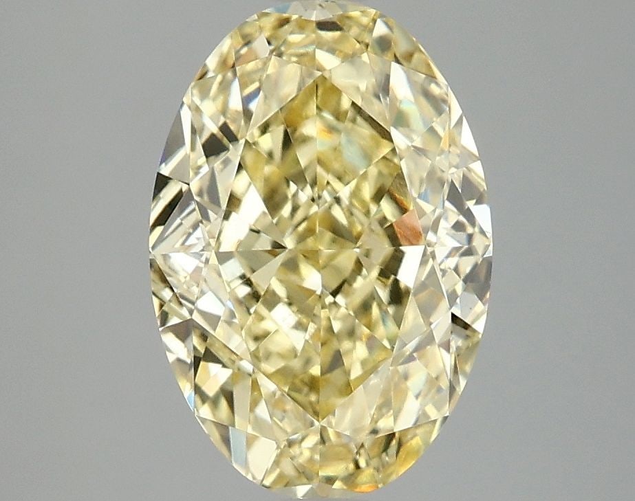 Loose Diamond - OVAL 3.04ct Fancy Vivid Yellow VS1: Loose Diamond - OVAL 3.04ct Fancy Vivid Yellow VS1 Source: This is a real non-mined Diamond that has been grown in a lab Shape: OVAL Carats: 3.04 Color: Fancy Vivid Yellow Certification: IGI Video: