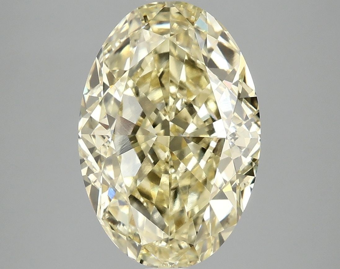 Loose Diamond - OVAL 5.01ct Fancy Vivid Yellow VS2: Loose Diamond - OVAL 5.01ct Fancy Vivid Yellow VS2 Source: This is a real non-mined Diamond that has been grown in a lab Shape: OVAL Carats: 5.01 Color: Fancy Vivid Yellow Certification: IGI Video: