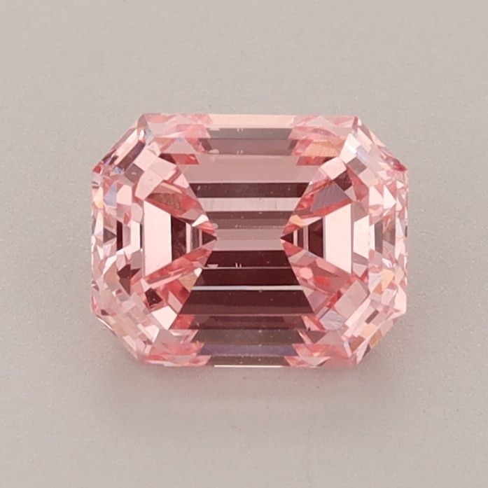 Loose Diamond - EMERALD 0.98ct Fancy Vivid Pink VS1: Loose Diamond - EMERALD 0.98ct Fancy Vivid Pink VS1 Source: This is a real non-mined Diamond that has been grown in a lab Shape: EMERALD Carats: 0.98 Color: Fancy Vivid Pink Certification: IGI Video: