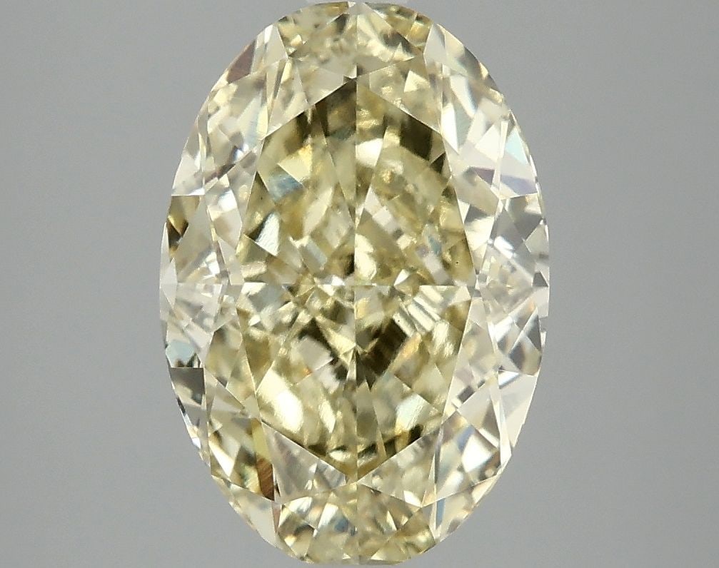 Loose Diamond - OVAL 4.03ct Fancy Vivid Yellow VS1: Loose Diamond - OVAL 4.03ct Fancy Vivid Yellow VS1 Source: This is a real non-mined Diamond that has been grown in a lab Shape: OVAL Carats: 4.03 Color: Fancy Vivid Yellow Certification: IGI Video: