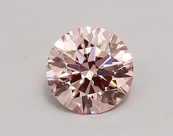 Ideal Loose Diamond - ROUND 0.64ct Fancy Intense Pink VVS2: Ideal Loose Diamond - ROUND 0.64ct Fancy Intense Pink VVS2 Source: This is a real non-mined Diamond that has been grown in a lab Shape: ROUND Carats: 0.64 Color: Fancy Intense Pink Certification: IGI