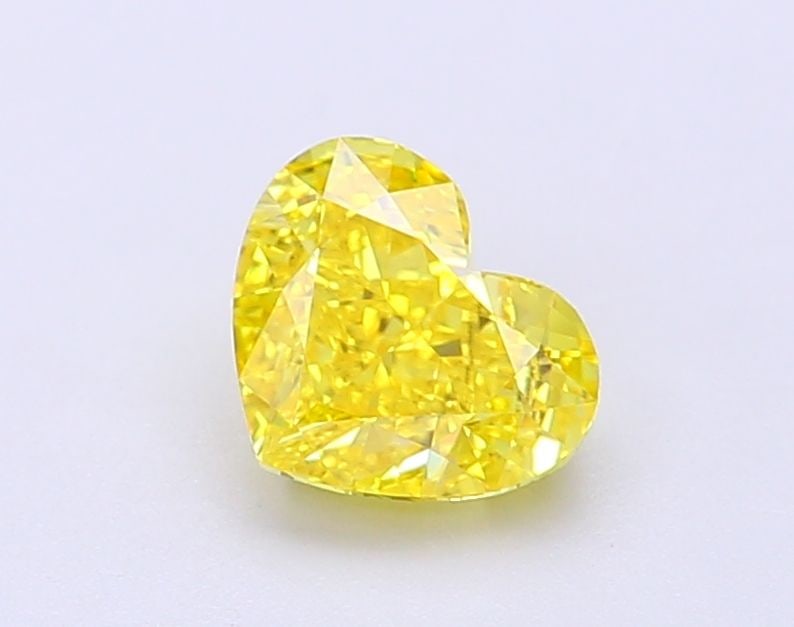 Loose Diamond - HEART 1.12ct Fancy Vivid Yellow VS1: Loose Diamond - HEART 1.12ct Fancy Vivid Yellow VS1 Source: This is a real non-mined Diamond that has been grown in a lab Shape: HEART Carats: 1.12 Color: Fancy Vivid Yellow Certification: IGI Video:
