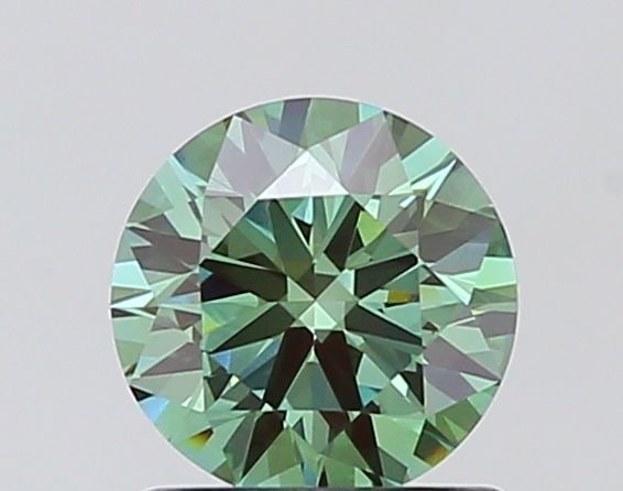 Ideal Loose Diamond - ROUND 0.9ct Fancy Vivid Green VVS2: Ideal Loose Diamond - ROUND 0.9ct Fancy Vivid Green VVS2 Source: This is a real non-mined Diamond that has been grown in a lab Shape: ROUND Carats: 0.9 Color: Fancy Vivid Green Certification: IGI Vide