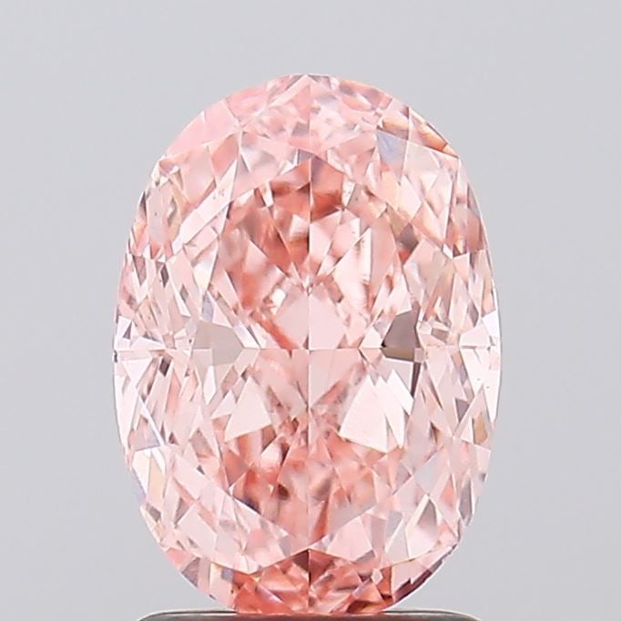 Loose Diamond - OVAL 2.03ct Fancy Vivid Pink VVS2: Loose Diamond - OVAL 2.03ct Fancy Vivid Pink VVS2 Source: This is a real non-mined Diamond that has been grown in a lab Shape: OVAL Carats: 2.03 Color: Fancy Vivid Pink Certification: IGI Video: