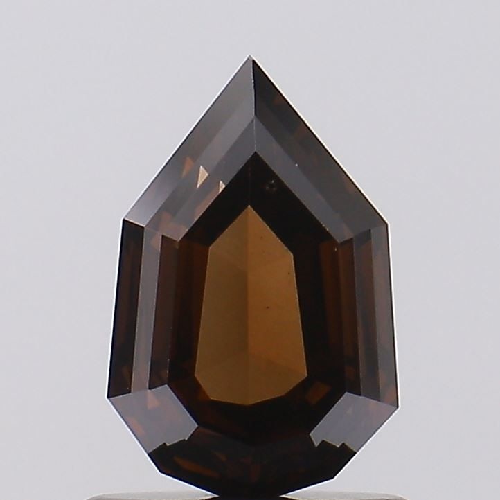 Loose Diamond - SHIELD 1.03ct Fancy Deep Brown VS2: Loose Diamond - SHIELD 1.03ct Fancy Deep Brown VS2 Source: This is a real non-mined Diamond that has been grown in a lab Shape: SHIELD Carats: 1.03 Color: Fancy Deep Brown Certification: NONE Video: