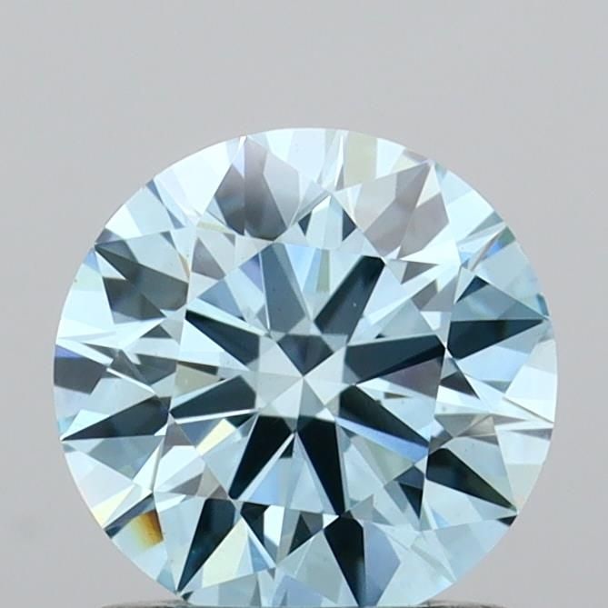Ideal Loose Diamond - ROUND 0.96ct Fancy Vivid Blue VS1: Ideal Loose Diamond - ROUND 0.96ct Fancy Vivid Blue VS1 Source: This is a real non-mined Diamond that has been grown in a lab Shape: ROUND Carats: 0.96 Color: Fancy Vivid Blue Certification: IGI