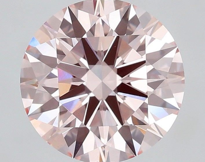 Ideal Loose Diamond - ROUND 1.55ct Fancy Pink VVS2: Ideal Loose Diamond - ROUND 1.55ct Fancy Pink VVS2 Source: This is a real non-mined Diamond that has been grown in a lab Shape: ROUND Carats: 1.55 Color: Fancy Pink Certification: IGI Video: