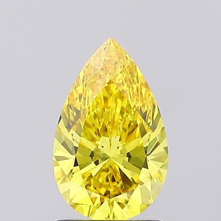 Loose Diamond - PEAR 1.26ct Fancy Vivid Yellow VS1: Loose Diamond - PEAR 1.26ct Fancy Vivid Yellow VS1 Source: This is a real non-mined Diamond that has been grown in a lab Shape: PEAR Carats: 1.26 Color: Fancy Vivid Yellow Certification: IGI Video: