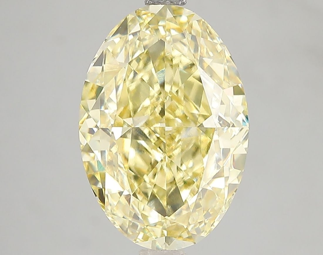 Loose Diamond - OVAL 5.03ct Fancy Vivid Yellow VS2: Loose Diamond - OVAL 5.03ct Fancy Vivid Yellow VS2 Source: This is a real non-mined Diamond that has been grown in a lab Shape: OVAL Carats: 5.03 Color: Fancy Vivid Yellow Certification: IGI Video: