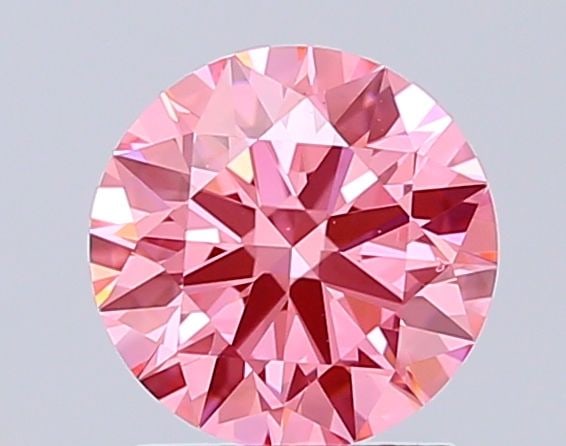 Ideal Loose Diamond - ROUND 1.5ct Fancy Vivid Pink VS1: Ideal Loose Diamond - ROUND 1.5ct Fancy Vivid Pink VS1 Source: This is a real non-mined Diamond that has been grown in a lab Shape: ROUND Carats: 1.5 Color: Fancy Vivid Pink Certification: IGI Video: