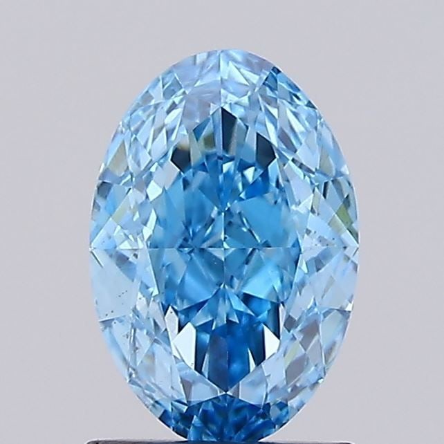 Loose Diamond - OVAL 1.63ct Fancy Vivid Blue VS2: Loose Diamond - OVAL 1.63ct Fancy Vivid Blue VS2 Source: This is a real non-mined Diamond that has been grown in a lab Shape: OVAL Carats: 1.63 Color: Fancy Vivid Blue Certification: IGI Video: