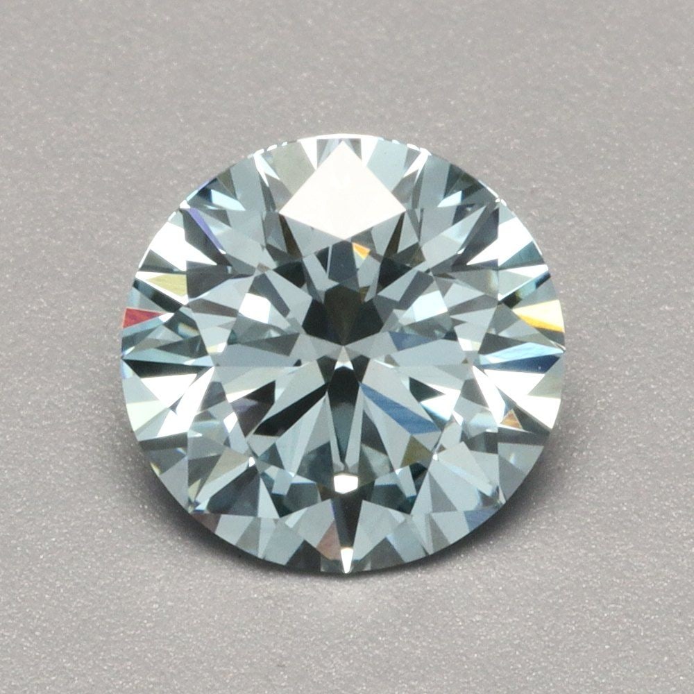 Ideal Loose Diamond - ROUND 1.06ct Fancy Vivid Blue VS1: Ideal Loose Diamond - ROUND 1.06ct Fancy Vivid Blue VS1 Source: This is a real non-mined Diamond that has been grown in a lab Shape: ROUND Carats: 1.06 Color: Fancy Vivid Blue Certification: IGI Video