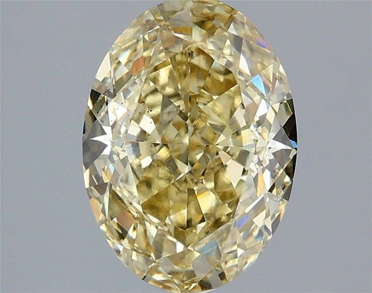 Loose Diamond - OVAL 3.01ct Fancy Yellow VS2: Loose Diamond - OVAL 3.01ct Fancy Yellow VS2 Source: This is a real non-mined Diamond that has been grown in a lab Shape: OVAL Carats: 3.01 Color: Fancy Yellow Certification: IGI Video: