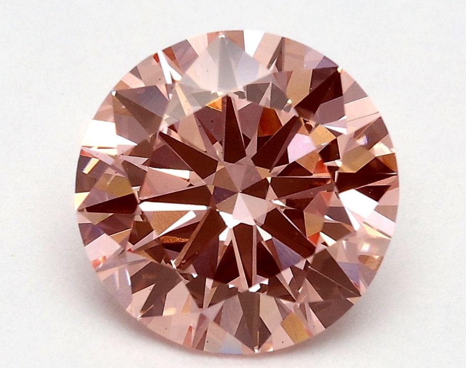 Loose Diamond - ROUND 1.8ct Fancy Vivid Pink VS1: Loose Diamond - ROUND 1.8ct Fancy Vivid Pink VS1 Source: This is a real non-mined Diamond that has been grown in a lab Shape: ROUND Carats: 1.8 Color: Fancy Vivid Pink Certification: IGI Video: