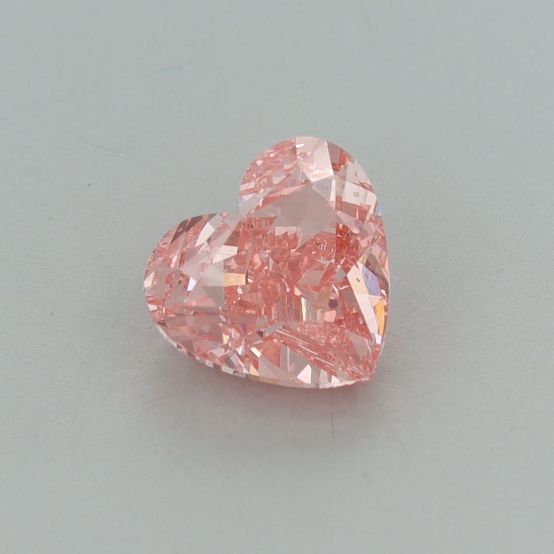 Loose Diamond - HEART 1.71ct Fancy Vivid Pink VVS2: Loose Diamond - HEART 1.71ct Fancy Vivid Pink VVS2 Source: This is a real non-mined Diamond that has been grown in a lab Shape: HEART Carats: 1.71 Color: Fancy Vivid Pink Certification: IGI Video: