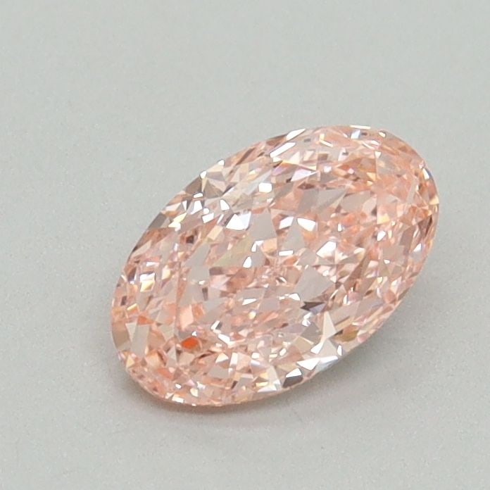 Loose Diamond - OVAL 0.63ct Fancy Vivid Pink VVS2: Loose Diamond - OVAL 0.63ct Fancy Vivid Pink VVS2 Source: This is a real non-mined Diamond that has been grown in a lab Shape: OVAL Carats: 0.63 Color: Fancy Vivid Pink Certification: IGI Video: