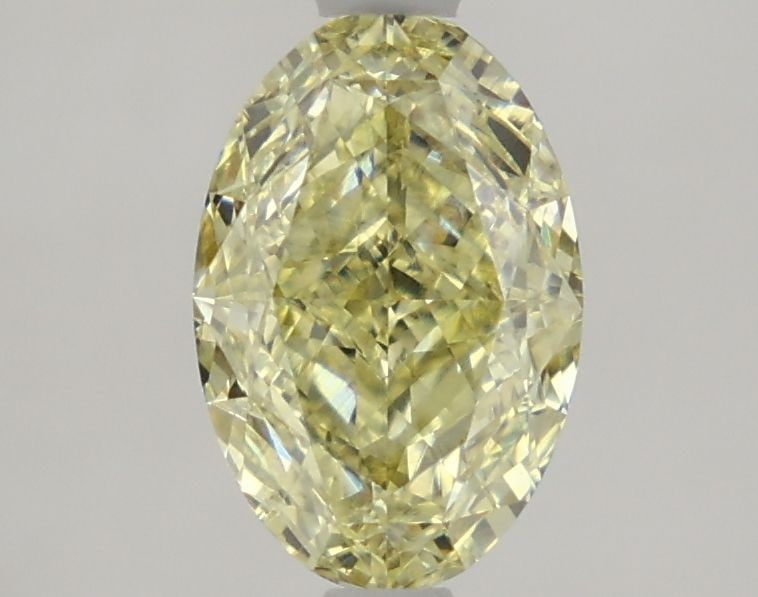 Loose Diamond - OVAL 1.77ct Fancy Yellow VS1: Loose Diamond - OVAL 1.77ct Fancy Yellow VS1 Source: This is a real non-mined Diamond that has been grown in a lab Shape: OVAL Carats: 1.77 Color: Fancy Yellow Certification: IGI Video: