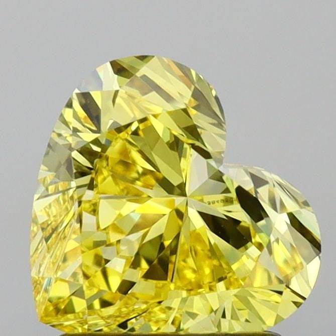 Loose Diamond - HEART 1.54ct Fancy Vivid Yellow VVS1: Loose Diamond - HEART 1.54ct Fancy Vivid Yellow VVS1 Source: This is a real non-mined Diamond that has been grown in a lab Shape: HEART Carats: 1.54 Color: Fancy Vivid Yellow Certification: IGI Video: