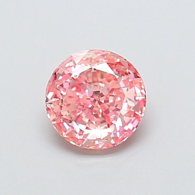 Loose Diamond - ROUND 1.02ct Fancy Vivid Pink VS1: Loose Diamond - ROUND 1.02ct Fancy Vivid Pink VS1 Source: This is a real non-mined Diamond that has been grown in a lab Shape: ROUND Carats: 1.02 Color: Fancy Vivid Pink Certification: IGI Video: