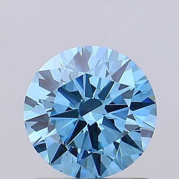 Ideal Loose Diamond - ROUND 1.07ct Fancy Vivid Blue VS2: Ideal Loose Diamond - ROUND 1.07ct Fancy Vivid Blue VS2 Source: This is a real non-mined Diamond that has been grown in a lab Shape: ROUND Carats: 1.07 Color: Fancy Vivid Blue Certification: IGI Video