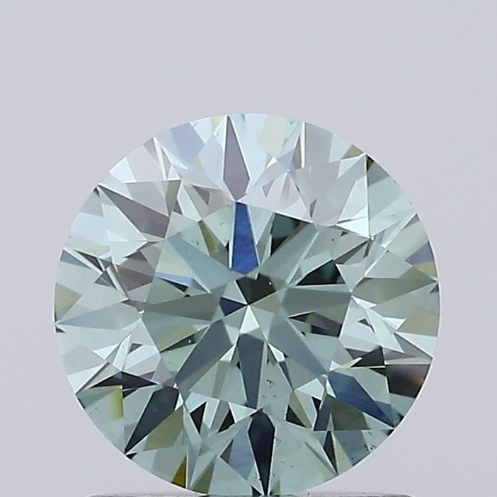 Ideal Loose Diamond - ROUND 1.21ct Fancy Vivid Green VS1: Ideal Loose Diamond - ROUND 1.21ct Fancy Vivid Green VS1 Source: This is a real non-mined Diamond that has been grown in a lab Shape: ROUND Carats: 1.21 Color: Fancy Vivid Green Certification: IGI Vid