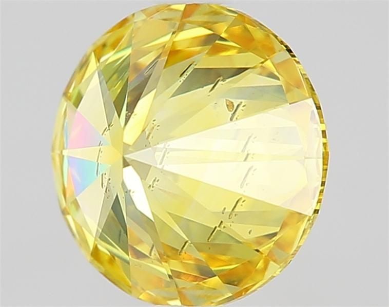 Loose Diamond - ROUND 1.09ct Fancy Vivid Yellow SI1: Loose Diamond - ROUND 1.09ct Fancy Vivid Yellow SI1 Source: This is a real non-mined Diamond that has been grown in a lab Shape: ROUND Carats: 1.09 Color: Fancy Vivid Yellow Certification: IGI Video: