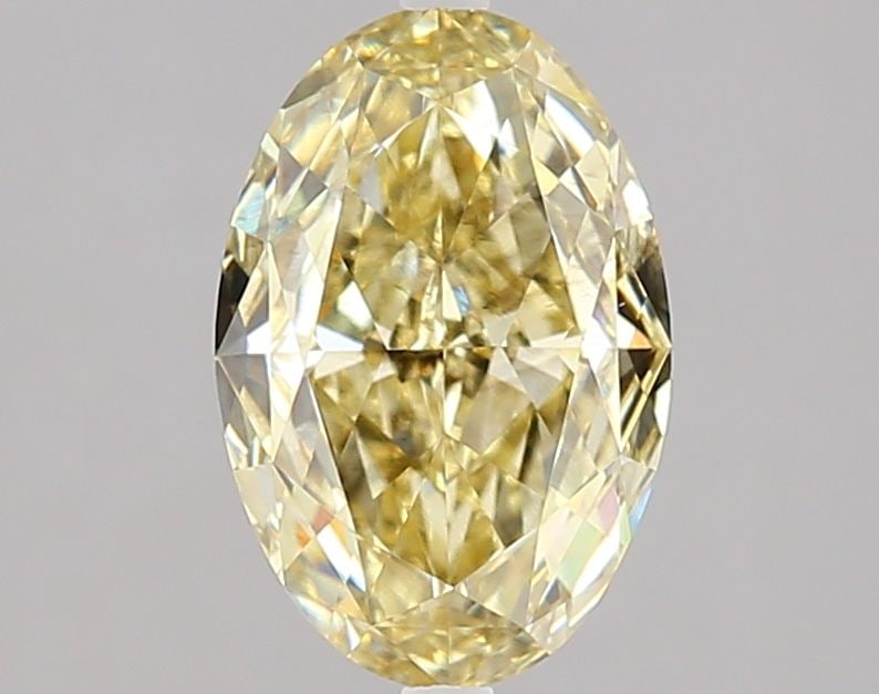 Loose Diamond - OVAL 1.8ct Fancy Intense Yellow VS2: Loose Diamond - OVAL 1.8ct Fancy Intense Yellow VS2 Source: This is a real non-mined Diamond that has been grown in a lab Shape: OVAL Carats: 1.8 Color: Fancy Intense Yellow Certification: IGI Video: