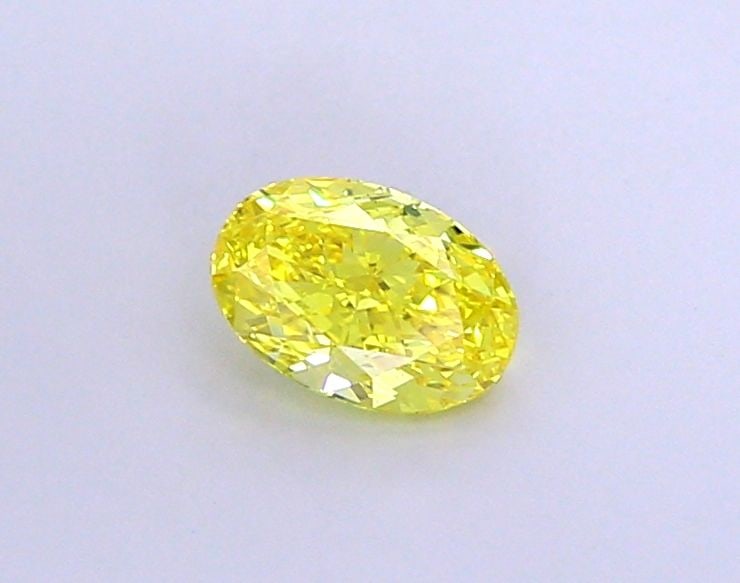 Loose Diamond - OVAL 1.02ct Fancy Vivid Yellow VS1: Loose Diamond - OVAL 1.02ct Fancy Vivid Yellow VS1 Source: This is a real non-mined Diamond that has been grown in a lab Shape: OVAL Carats: 1.02 Color: Fancy Vivid Yellow Certification: IGI Video: