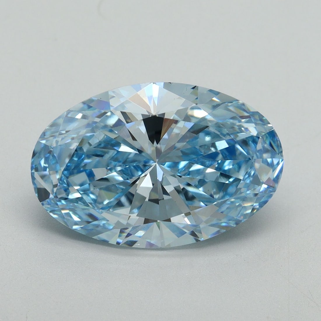Loose Diamond - OVAL 5.28ct Fancy Vivid Blue VS1: Loose Diamond - OVAL 5.28ct Fancy Vivid Blue VS1 Source: This is a real non-mined Diamond that has been grown in a lab Shape: OVAL Carats: 5.28 Color: Fancy Vivid Blue Certification: IGI Video: Video