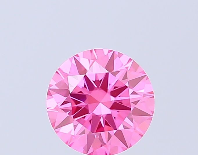 Ideal Loose Diamond - ROUND 1.09ct Fancy Vivid Pink VVS2: Ideal Loose Diamond - ROUND 1.09ct Fancy Vivid Pink VVS2 Source: This is a real non-mined Diamond that has been grown in a lab Shape: ROUND Carats: 1.09 Color: Fancy Vivid Pink Certification: IGI Vide