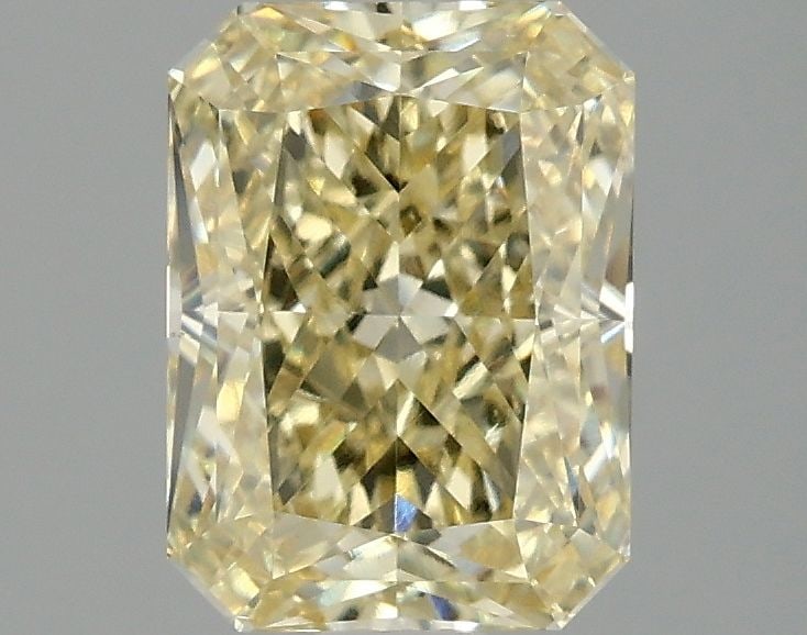 Loose Diamond - RADIANT 2.1ct Fancy Yellow VS1: Loose Diamond - RADIANT 2.1ct Fancy Yellow VS1 Source: This is a real non-mined Diamond that has been grown in a lab Shape: RADIANT Carats: 2.1 Color: Fancy Yellow Certification: IGI Video: