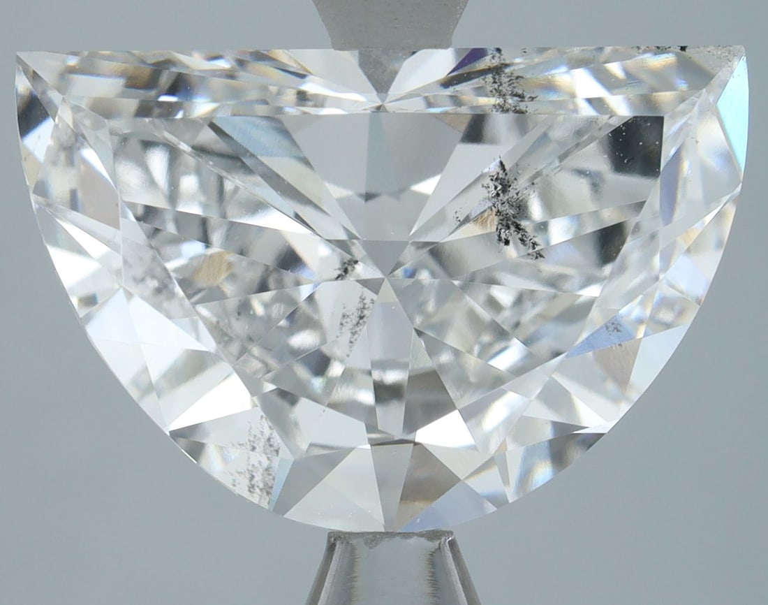 Loose Diamond - HALF MOON 3.0ct E SI1: Loose Diamond - HALF MOON 3.0ct E SI1 Source: This is a real non-mined Diamond that has been grown in a lab Shape: HALF MOON Carats: 3.0 Color: E Clarity: SI1 Certification: IGI Video:
