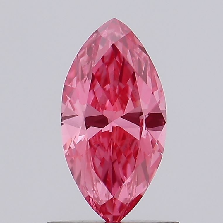 Loose Diamond - MARQUISE 0.73ct Fancy Vivid Pink VS1: Loose Diamond - MARQUISE 0.73ct Fancy Vivid Pink VS1 Source: This is a real non-mined Diamond that has been grown in a lab Shape: MARQUISE Carats: 0.73 Color: Fancy Vivid Pink Certification: IGI Video
