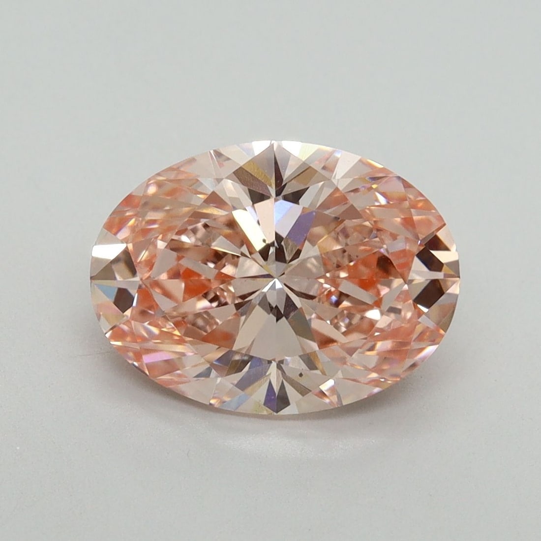 Loose Diamond - OVAL 3.01ct Fancy Vivid Pink VS2: Loose Diamond - OVAL 3.01ct Fancy Vivid Pink VS2 Source: This is a real non-mined Diamond that has been grown in a lab Shape: OVAL Carats: 3.01 Color: Fancy Vivid Pink Certification: IGI Video: Video