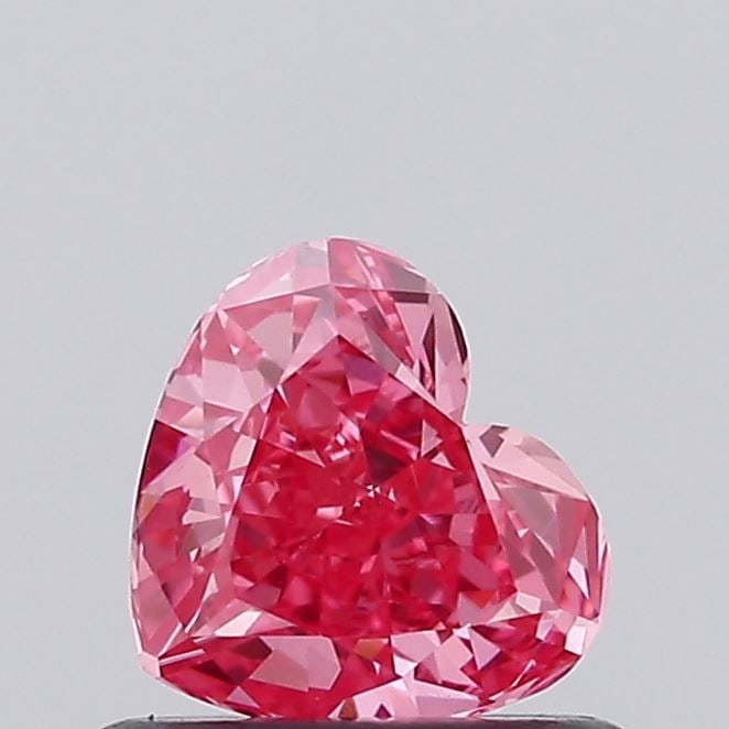 Loose Diamond - HEART 0.57ct Fancy Vivid Pink VVS2: Loose Diamond - HEART 0.57ct Fancy Vivid Pink VVS2 Source: This is a real non-mined Diamond that has been grown in a lab Shape: HEART Carats: 0.57 Color: Fancy Vivid Pink Certification: IGI Additional